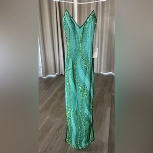Sparkly formal green dress.